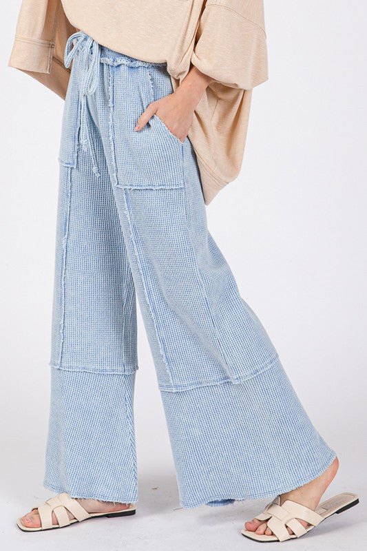 SAGE + FIG Waffle Textured Wide Leg Mineral Washed Pants - Ormond Beach BoutiqueTrendsiOrmond Beach Boutique3a4ebde3 - 9998 - 4bd9 - bb36 - e46c7526dedf - Max100100440661895100100440661895Light BlueS