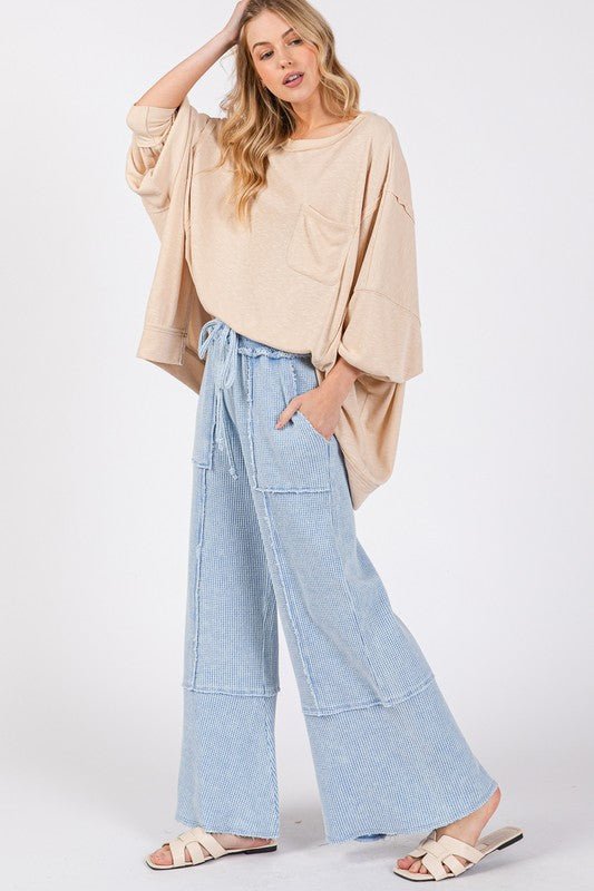 SAGE + FIG Waffle Textured Wide Leg Mineral Washed Pants - Ormond Beach BoutiqueTrendsiOrmond Beach Boutique93ad3be6 - 021b - 4e72 - 90a4 - 19d2938b57cc - Max100100440661895100100440661895Light BlueS